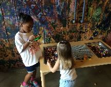 Girls playing with legos