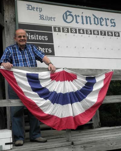 Scorekeeper Larry Benner